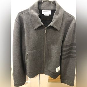 Thom Browne grey jacket.